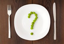 plate with peas in the shape of a question mark