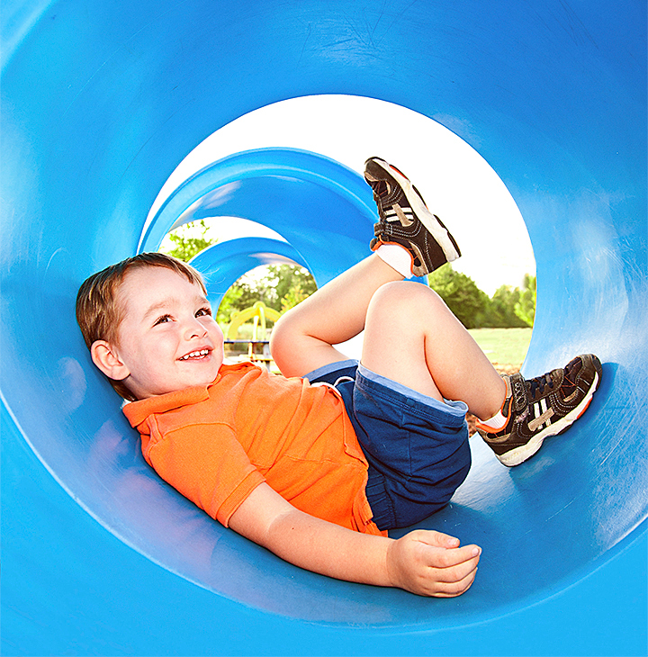 boy playing on playground