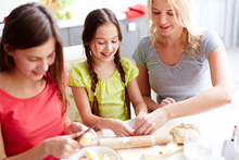 mother and daughters baking
