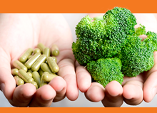 hands holding vitamins and broccoli