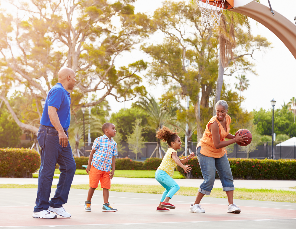 family playing basketball