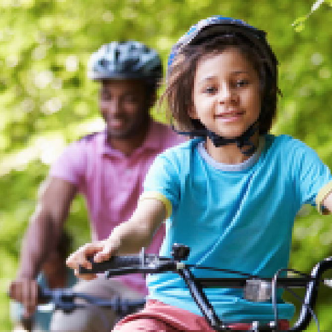 kid and dad on bikes