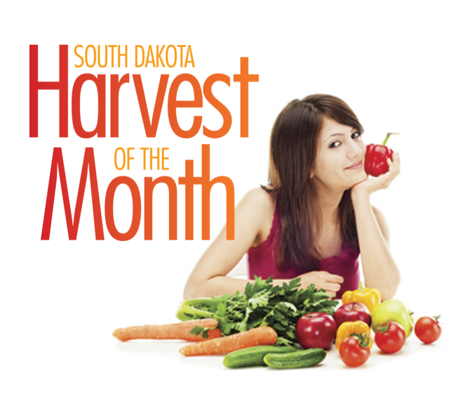 South Dakota Harvest of the Month logo and woman with veggies